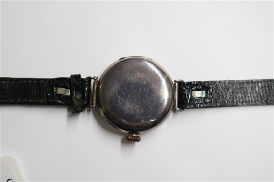 A gentlemans early 20th century silver manual wind wrist watch, retailed by Henry Birks & Sons.